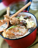 Saucepan of chicken with morels,tarragon and creamy sauce