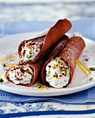 Sicilian Cannolis with ricotta and crushed pistachios