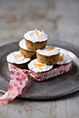 Small fruit cakes topped with cream