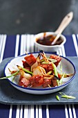 Gammon and spring onion skewers
