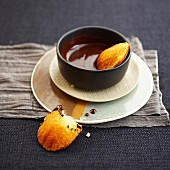 Madeleines with melted chocolate