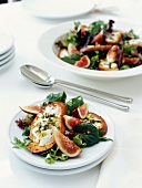 Cream cheese on toast with figs and salad