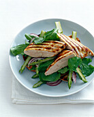 Green asparagus salad with grilled chicken breasts