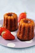 Cannelés and strawberries