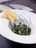 Bass Carpaccio and seaweed Tartare served with toasts