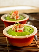 Cream of pea soup with shrimps