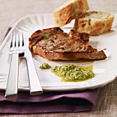 Veal chop with garlic and parsley sauce