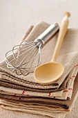 Tea cloths,wooden spoon and whisk