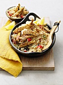 Pilaf rice with sliced chicken breasts