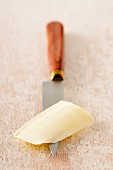 Piece of butter on a kitchen knife