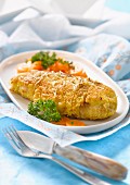Chicken breast coated with grated cheese