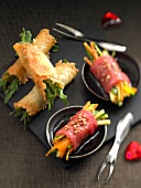 Parmesan and rocket rolls,carpaccio and vegetable appetizers