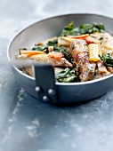 Guinea-fowl and swiss chard fricassée with green tapenade