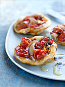 Tomato-onion savoury Tatin tartlets