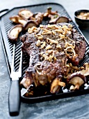 Beef chop grilled with shallots and mushrooms