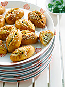 Small turkish breads with feta, yoghurt and parsley filling