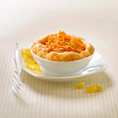 Grated carrots with raisins and orange foam