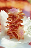 Star-shaped shortbread and pink sugar cookies