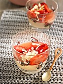 Panacotta with strawberries and almonds