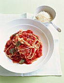 Spaghetti with two meat and tomato sauce