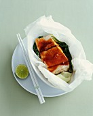 Pollack with bok choy in parchment paper