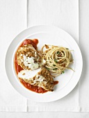 Crispy chicken breast with tomato puree and spaghettis with herbs and fried garlic