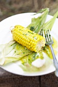 Corn on the cob with melted herb butter