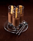 Chocolate and caramel delicacy with sesame seed fingers of bread