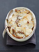 Duck and celeriac Comté cheese-topped dish