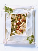 Turkey breasts,sun-dried tomatoes and herbs cooked in wax paper