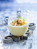 Cream of white asparagus soup with flaked king crab meat