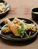 Roast chicken legs with sesame seeds