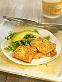 Tofu coated in polenta and fresh herbs