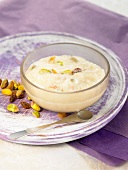Basmati rice pudding with cardamom,pistachios and raisins