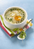 Coodled egg with goat's cheese and herbs