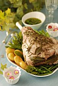 Shoulder of lamb cooked with herbs in a cloth