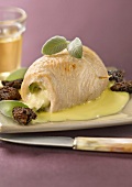 Rolled chicken breast stuffed with mozzarella and sage, sauteed morels and yellow wine sauce