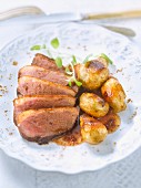 Duck breast with Jerusalem artichokes and spicy red wine
