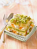 Leek and smoked trout cheese-topped dish