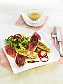 Red and yellow chicory salad with mustard sauce