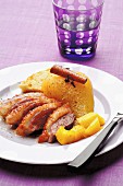 Duck's breast with roast pears and mangoes