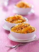 Grated carrots with orange, herbs and raisins