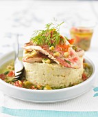 Mashed potato timbale with red mullet fillets, tomatoes and olives