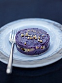 Purple potato mash with apples and dried fruit