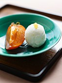 Slice of kaki with yuzu sorbet