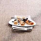 Rolled crepes garnished with chestnuts