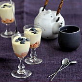 Pink biscuit and white chocolate mousse with blueberries