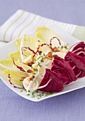 Yellow and red endive and hard-boiled egg salad