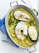 Cod steaks with onions,curry,thyme and bay leaves