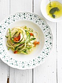 Spaghetti with sun-dried tomatoes,zucchinis and asparagus